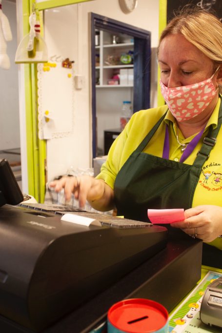 Serving at the till